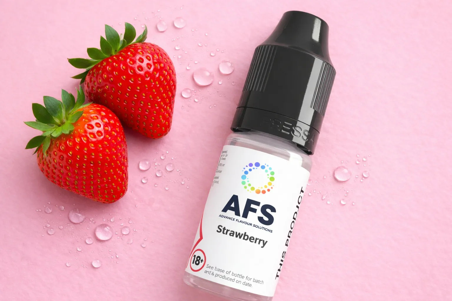AFS Strawberry e-liquid bottle with two strawberries on a pink background