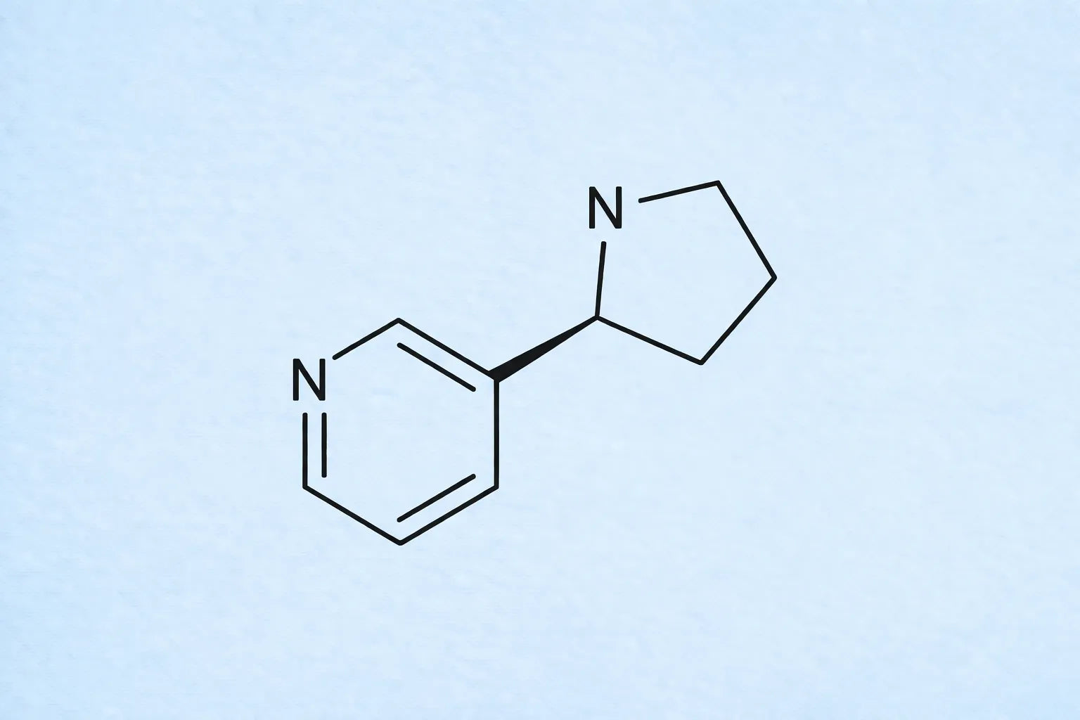 Freebase nicotine chemical structure diagram on a light blue background